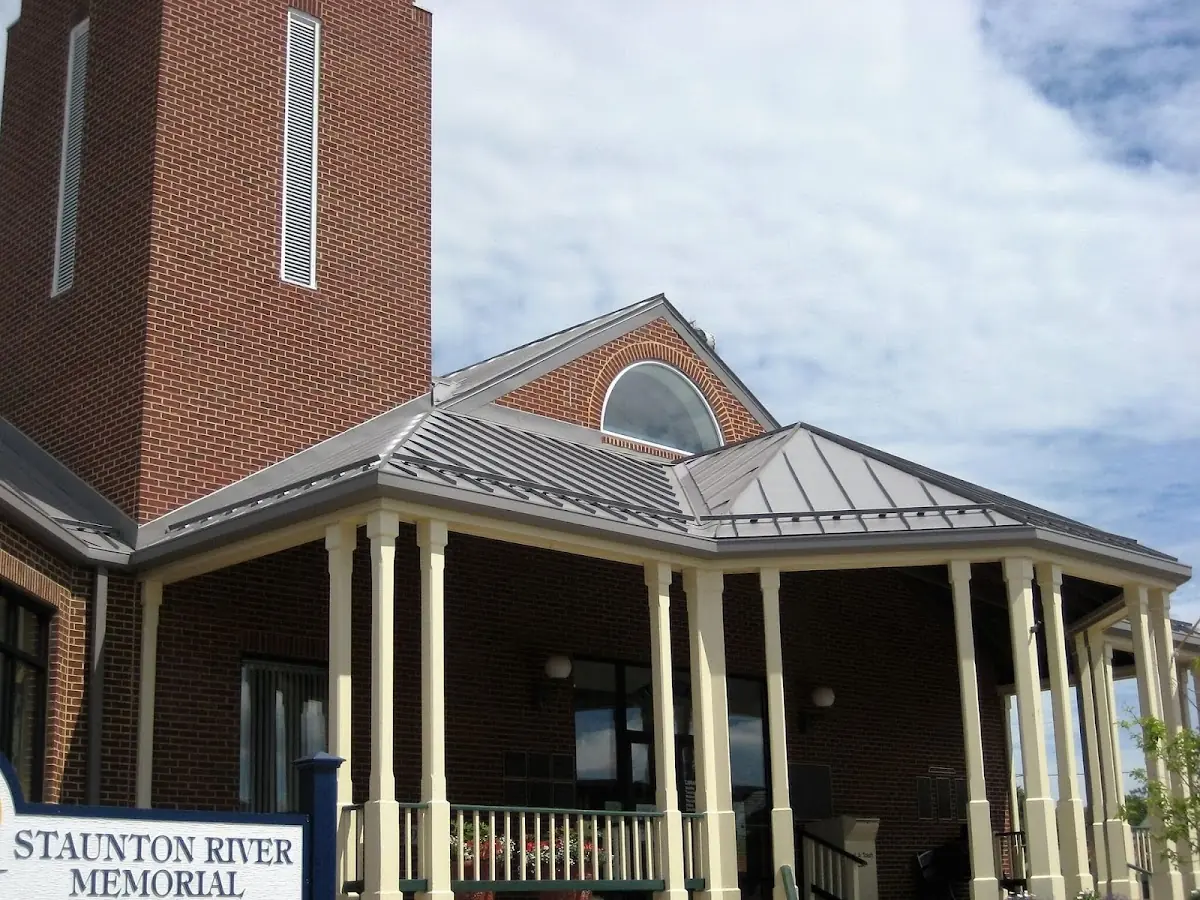 Skilled roofing craftsmen working on a residential roof in Southeast